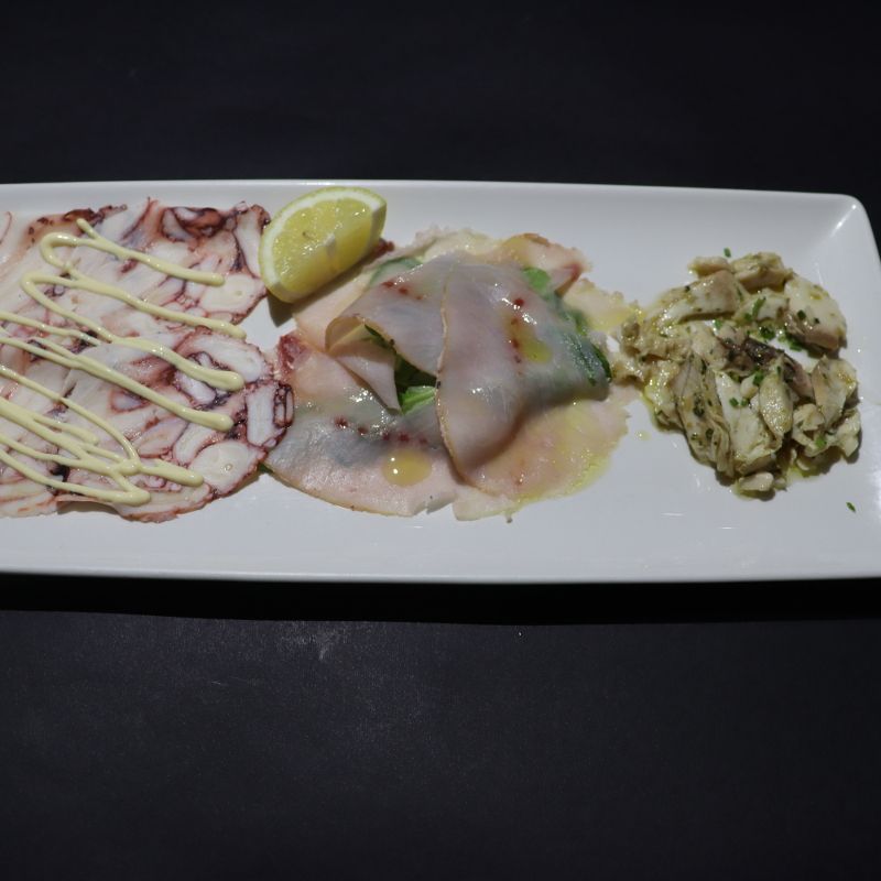 Pike in sauce , swordfish carpaccio, octopus carpaccio