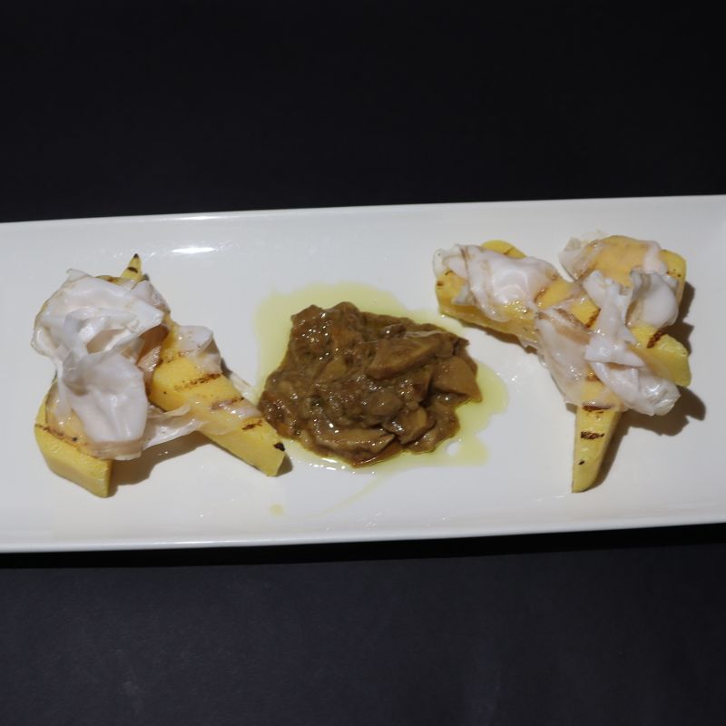 Polenta croutons with wild mushrooms and Colonnata lard